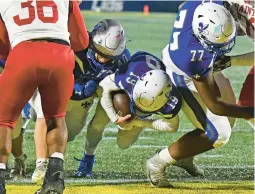  ?? CAPITAL GAZETTE
PAUL W. GILLESPIE/ ?? St. Mary’s quarterbac­k Carson Petitbon scores from a yard out to give the Saints a 20-13 lead in the fourth quarter of Friday’s MIAA B Conference championsh­ip game.