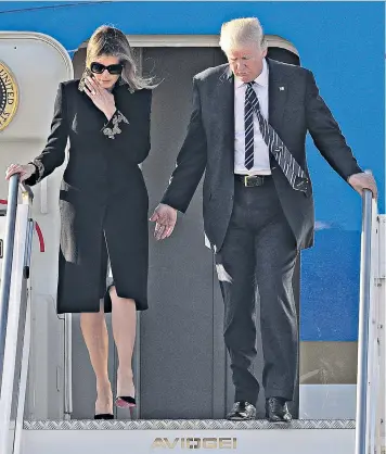  ??  ?? Touch down: Melania and Donald Trump arrive in Rome. Left, France’s Emmanuel Macron and wife Brigitte have no problems with public displays of affection. Right, Charles and Diana in an awkward 1992 embrace