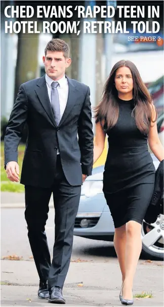  ??  ?? > Ched Evans arrives at Cardiff Crown Court with fiancée Natasha Massey yesterday