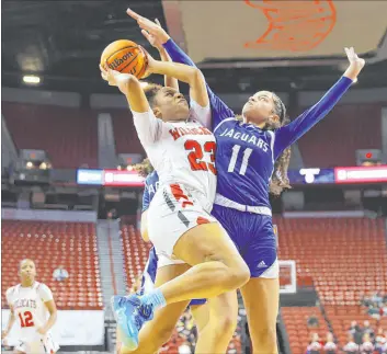  ?? Las Vegas Review-journal ?? Erik Verduzco Las Vegas’ Kayla Terry drives to the basket against Desert Pines’ Alanna Jackson during the Wildcats’ 51-49 win in the 4A title game. Terry finished with 16 points.