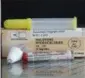  ?? ASSOCIATED PRESS FILE ?? A tube of Naloxone Hydrochlor­ide, also known as Narcan, is shown for scale next to a lipstick container.