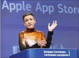  ?? GEERT VANDEN WIJNGAERT THE ASSOCIATED PRESS ?? EU Commission Vice President Margrethe Vestager addresses the media on Apple Music streaming services at EU headquarte­rs in Brussels on Monday. Vestager addressed the media after the 27-nation bloc slapped a massive 1.8 billion-euro fine on Apple for allegedly abusing its dominant position when it comes to music streaming services.