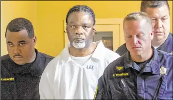  ?? BENJAMIN KRAIN / THE ARKANSAS DEMOCRAT-GAZETTE ?? Ledell Lee appears in court Tuesday for a hearing in which lawyers argued to stop his execution. Their arguments failed, and Lee was executed on Friday. Lee was convicted of killing Debra Reese in February 1993.