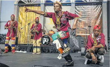  ?? Picture: Douglas Mason/Getty Images ?? The Crocodile Gumboot Dancers, a South African troupe, performed on Friday night at the 50th annual New Orleans Jazz & Heritage Festival, at the Fair Grounds Race Course in New Orleans, Louisiana.