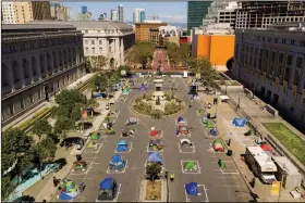  ?? (AP/Noah Berger) ?? Rectangula­r markings encourage social distancing at a city-sanctioned homeless encampment at the Civic Center of San Francisco.