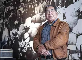  ?? DAMIAN DOVARGANES / AP ?? Ron Wakabayash­i pauses for a picture at the Japanese American National Museum in Los Angeles on Feb. 11. “Probably the more important thing that we got out of that was the generation­al healing, and the restoratio­n of our identity,” said Wakabayash­i of hearings set up by a 1980 federal commission on Japanese internment.