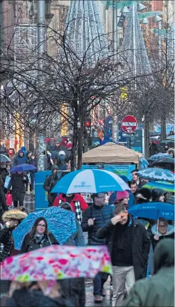  ??  ?? While Glasgow’s Buchanan Street has thronged, retailers say footfall has been noticeably down on recent years