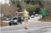  ?? GEORGE SAKKESTAD/STAFF ?? All lanes of Highway 17 were closed earlier this month between Summit Road and Vine Hill Road in Scotts Valley due to imminent slide danger.