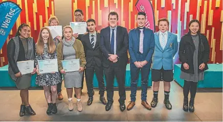  ?? PHOTO: BRADY DYER ?? Chris Bishop pictured with the 2016 Hutt City Youth Awards winners. Art winner Julian Dennison is represente­d by his cousin Gabriel Tupou, and another art nominee, Jeremy Richardson, by his mum, Lynda Carter.