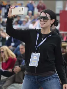  ??  ?? Clare Considine watching the Red Arrows.