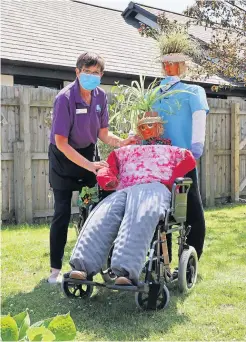  ??  ?? Imaginativ­e Staff member Doris Scott with one of the displays