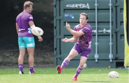  ?? PHOTO: GETTY IMAGES ?? Men at the top . . . Newly announced Chiefs cocaptain Brad Weber passes the ball during a skills session in Hamilton yesterday. Close by is the man he is sharing the captaincy with, Sam Cane.