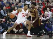  ?? JAY LAPRETE — THE ASSOCIATED PRESS ?? Ohio State’s Kaleb Wesson, left, posts up against Minnesota’s Daniel Oturu during the first half Thursday in Columbus, Ohio.