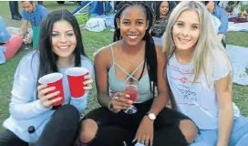 ?? Picture: LOUISE LIEBENBERG ?? WEEKEND BUZZ: Friends, from left, Dahne Straton, Naledi Mkhulisi and Sam Swales sampled the tasty food offerings at the last Food Truck Friday event held outside Werk in the Baakens Valley. There is another event today.