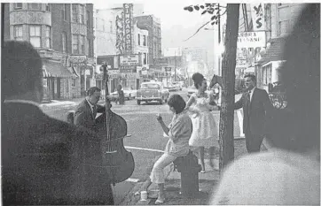  ?? NEWBERRY LIBRARY ?? An undated photograph in the collection shows Barbara Streisand sitting on a hydrant outside Mister Kelly’s.