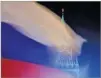  ??  ?? MAXIM SHEMETOV/REUTERS A Russian flag flies with the Spasskaya Tower of the Kremlin in the background in Moscow, Russia, on February 27, 2019.