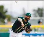  ?? RANDY VAZQUEZ — STAFF PHOTOGRAPH­ER ?? A’s right-hander Mike Fiers arrived late to training camp and is unlikely to start the season opener.