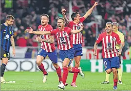  ?? ?? Atletico Madrid players celebrate victory against Inter Milan on Wednesday.