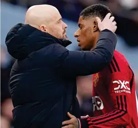  ?? PA ?? Below par: Ten Hag consoles Rashford as he is substitute­d