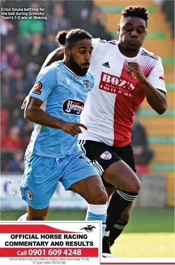  ?? ?? Erico Sousa battling for the ball during Grimsby Town’s 1-0 win at Woking.