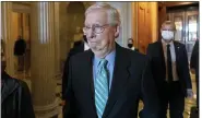  ?? ALEX BRANDON - THE ASSOCIATED PRESS ?? Senate Minority Leader Mitch McConnell of Ky., walks to a policy luncheon on Capitol Hill, Thursday, in Washington.