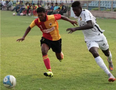  ??  ?? Players from BK Hacken and East Bengal FC tussle during their junior boys ( Under- 17) match of the Subroto Cup schools football tournament in New Delhi on Wednesday.