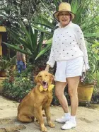  ??  ?? Sonya Garcia with her friendly and playful Golden Retriever Ooggoo.