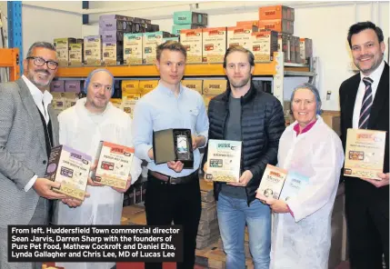  ??  ?? From left. Huddersfie­ld Town commercial director Sean Jarvis, Darren Sharp with the founders of Pure Pet Food, Mathew Cockroft and Daniel Eha, Lynda Gallagher and Chris Lee, MD of Lucas Lee