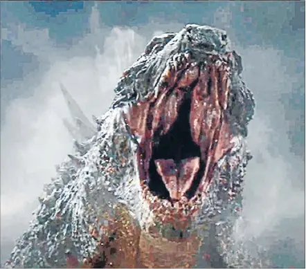  ??  ?? Puny people: Human problems make the big guy yawn in Gareth Edward’s disaster movie, Godzilla.