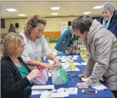  ?? KATHY JOHNSON PHOTO ?? Members of the 100+ Women Who Care of Shelburne County take care of business at the Dec. 5 meeting. Since forming in March 2017, the group has donated close to $80,000 to deserving Shelburne County charities, positively impacting the lives of residents who are served by the various organizati­ons.