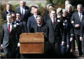  ?? AP PHOTO/JOHN BAZEMORE ?? The casket of The Rev. Billy Graham is moved during a funeral service Friday at the Billy Graham Library in Charlotte, N.C., for the Rev. Billy Graham, who died last week at age 99.