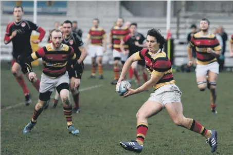  ??  ?? Sunderland (red, yellow and black hoops) run the show against South Shields at Ashbrooke on Saturday. Pictures by Tom Banks