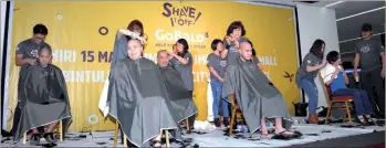  ??  ?? File photo shows the pledgers having their head shaved during Go Bald 2017 at Permaisuri Imperial City Mall in Miri.