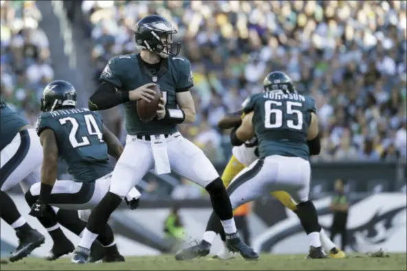  ?? MICHAEL PEREZ — THE ASSOCIATED PRESS ?? The cool sense of command displayed by Carson Wentz on the field has made the Eagles his team quicker than anyone could have imagined. That would include the rest of the Eagles.