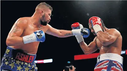  ?? /Reuters ?? Second beating: Tony Bellew, left, lands a left jab on David Haye in the heavyweigh­t fight in London.