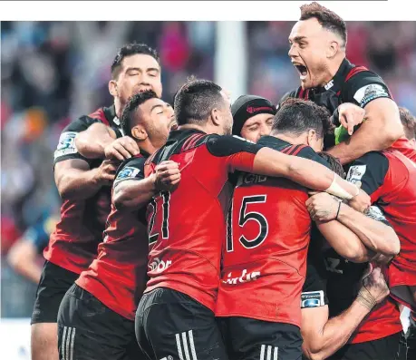  ??  ?? Israel Dagg and the Crusaders celebrate their dramatic win yesterday over the Highlander­s.