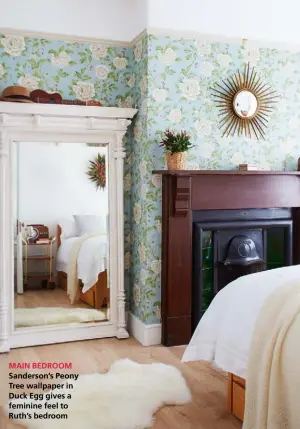  ??  ?? MAIN BEDROOM Sanderson’s Peony Tree wallpaper in Duck Egg gives a feminine feel to Ruth’s bedroom