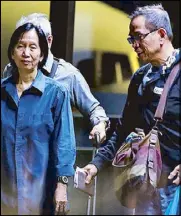  ?? RUDY SANTOS ?? Communist Party of the Philippine­s leaders Benito and Wilma Tiamzon arrive at the NAIA last night after attending peace talks abroad.