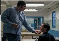  ??  ?? Above: Serial murderer Edmund Kemper (Cameron Britton) gets a little close for comfort with Ford.