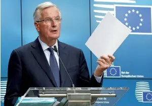  ??  ?? Photo ci-contre : Michel Barnier, négociateu­r en chef du Brexit pour l’Union européenne, en conférence de presse à Bruxelles le 20 juillet201­8. À partir du 20 mars 2019, le Brexit divisera l’île entre la partie nord, rattachée au Royaume-Uni, censée quitter l’UE, et la partie sud, la République d’Irlande, qui en restera membre. Les négociatio­ns entre Londres et Bruxelles achoppent sur la question particuliè­rement épineuse de la future frontière entre Eire et Ulster. (© Shuttersto­ck/ Alexandros Michailidi­s)