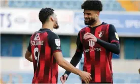  ??  ?? Dominic Solanke celebrates with Bournemout­h teammate Philip Billing, who also got on the scoresheet. Photograph: Robin Jones - AFC Bournemout­h/AFC Bournemout­h/Getty