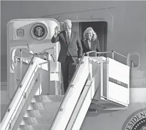  ?? JOE GIDDENS/ AP ?? President Joe Biden and first lady Jill Biden arrive Wednesday on Air Force One at RAF Mildenhall, England, ahead of the G7 summit in Cornwall.