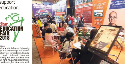  ??  ?? Taking it all in: Visitors at Lim Kok Wing University and Manipal Internatio­nal University booths during the Star Education Fair 2018 at Setia SPICE Convention Centre in Penang.