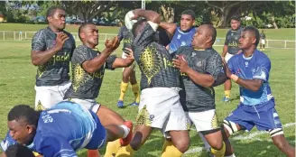  ?? Photo: Waisea Nasokia ?? Aseri Buli of Koroba Chiefs (right) assists the ball carrier against Nadi Bay Sharks during the Currency One/Jack’s sponsored Nadi Rugby Union franchise competitio­n at Prince Charles Park, Nadi on November 16, 2019.