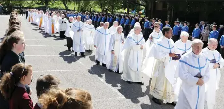  ??  ?? Priests of the Diocese of Elphin enter the Cathedral surrounded by Guards of Honour from six schools in Sligo and Roscommon.