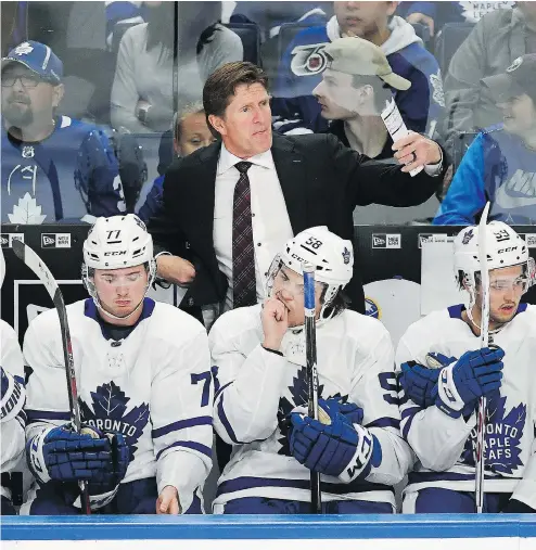  ?? ADRIAN KRAUS / THE ASSOCIATED PRESS ?? Head coach Mike Babcock still has some decisions to make on defence as the pre-season winds down for the Leafs.