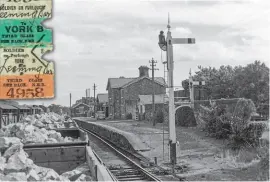  ?? G REATC ENTRALR AILWAYANAU CTIONS ?? Rural activity: There are signs of activity at Leeming Bar station ( now part of the Wensleydal­eR ailway) i n this atmospheri­c1 959s cene, a sa K1c lass2 - 6- 0 shunts cattle wagons on the left and someone strides towards the Ford Prefect parked on the platform. Meanwhile, wagons loaded with limestone from local quarries are readyt o be deliveredt o customersT. he NorthY orkshires tationw ast he startingp oint in the pre- Groupinge ra for a soldiero n furlought o travelt o York.
TRANSPORTT­REASURY/ NORFROIRSR EST
Inset: A North EasternR ailwayt icket issuedt o a soldiero n furloughf or return travel from LeemingB arto York.