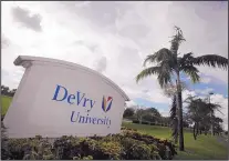  ?? ASSOCIATED PRESS ?? This is the entrance to DeVry University in Miramar, Florida. Since 2014, DeVry has closed 39 campuses due to falling enrollment.