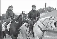  ?? AP/ GARRY JONES ?? Trainer Joe Sharp ( right) and his wife and former jockey Rosie Napravnik ( aboard Girvin) are in charge of getting the horse prepared for Saturday’s Kentucky Derby.