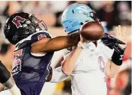  ?? ?? Defensive lineman John Daka, left, tallied one of the Roughnecks’ five sacks in the win.